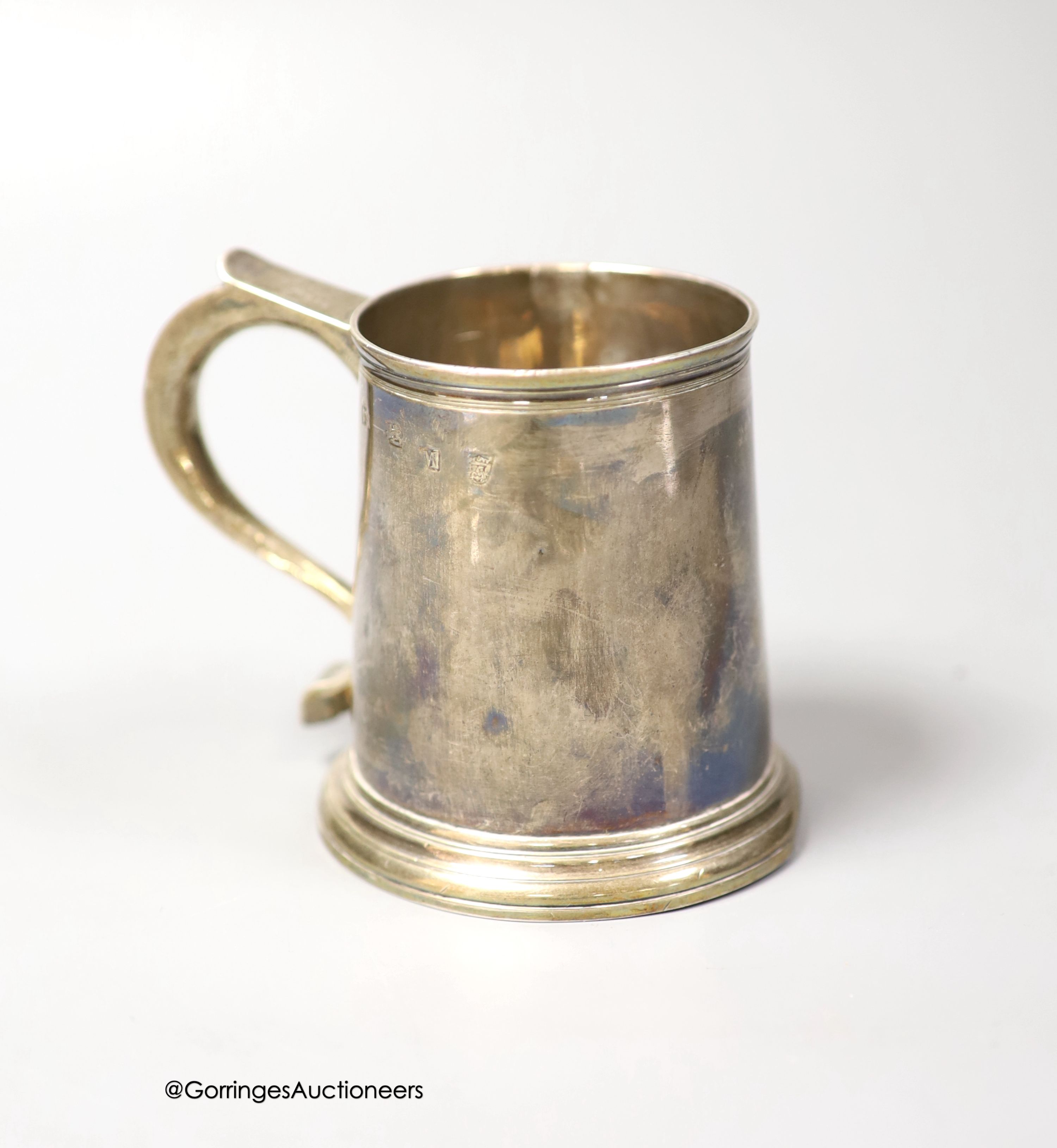 An early George II silver small mug, by James Smith I, London, 1727, height 92mm, 156 grams (a.f.)